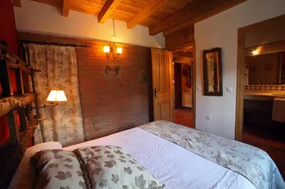 Cama o camas de una habitación en Casa rural El Leñador