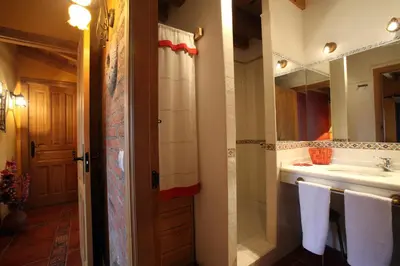 Un baño de Casa rural El Leñador