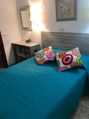 Cama o camas de una habitación en Hostal Argentina EN CACERES