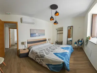 Cama o camas de una habitación en Apartamentos Turísticos Hornillo AT-CC-00681