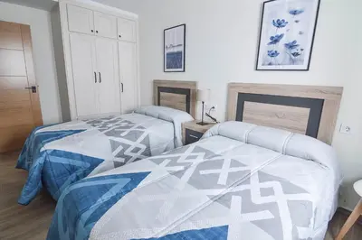 Cama o camas de una habitación en Apartamentos Turísticos Hornillo AT-CC-00681