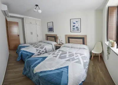 Cama o camas de una habitación en Apartamentos Turísticos Hornillo AT-CC-00681