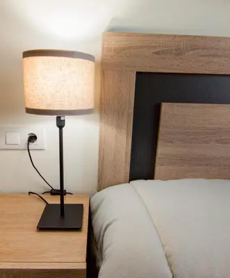 Cama o camas de una habitación en Apartamentos Turísticos Hornillo AT-CC-00681