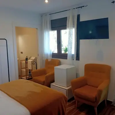 Cama o camas de una habitación en Habitación ideada para parejas con Jacuzzi, desayuno romántico y opción de cenas en su restaurante