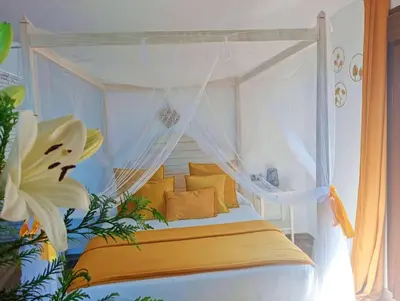 Cama o camas de una habitación en Habitación ideada para parejas con Jacuzzi, desayuno romántico y opción de cenas en su restaurante
