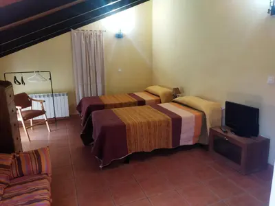 Cama o camas de una habitación en Las Henrenes