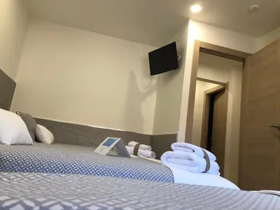 Cama o camas de una habitación en El Mirador de Gredos 2