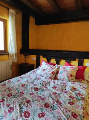 Cama o camas de una habitación en CASA RURAL EL TOLEO
