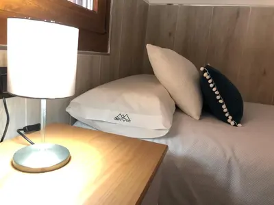 Cama o camas de una habitación en El Mirador de Gredos 3