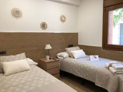 Cama o camas de una habitación en El Mirador de Gredos 1