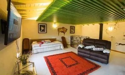 Cama o camas de una habitación en Casa del Cerro es una singular casa rural de fácil acceso