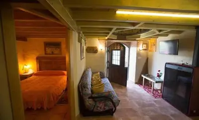 Cama o camas de una habitación en Casa del Cerro es una singular casa rural de fácil acceso