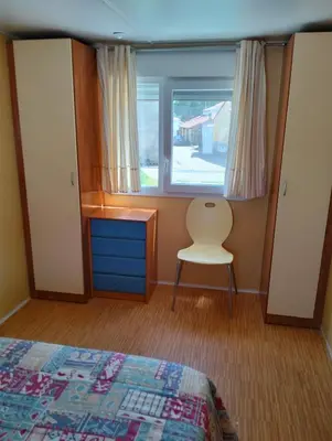 Cama o camas de una habitación en CASITA AZUL MUÑICO , AVILA