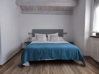 Cama o camas de una habitación en La Cartería de Trabanca