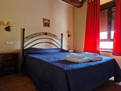 Cama o camas de una habitación en Hostal La Plata