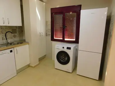 Una cocina o zona de cocina en Alojamiento Coria