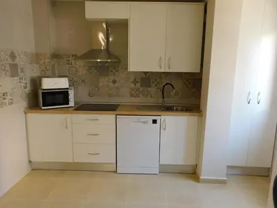 Una cocina o zona de cocina en Alojamiento Coria