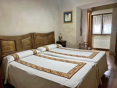 Cama o camas de una habitación en Casa La Colmena Ávila