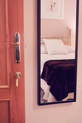 Cama o camas de una habitación en Apartamentos Turísticos Ceres Parking Gratis