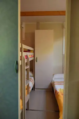 Cama o camas de una habitación en Bungalows, Camping Vega de Francia