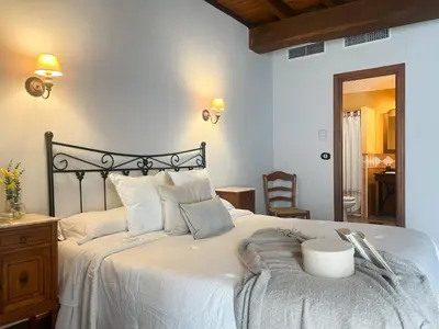 Cama o camas de una habitación en Casa Rural La Fuente del Jerte