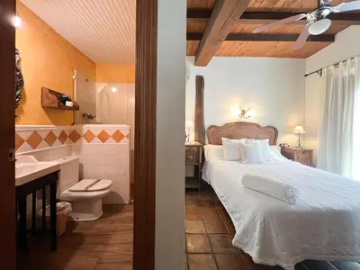 Cama o camas de una habitación en Casa Rural La Fuente del Jerte