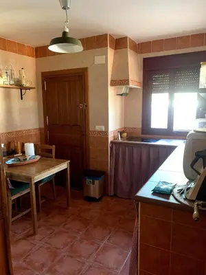 Una cocina o zona de cocina en Casa situada en un entorno natural Casa Rural La Serena