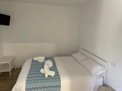 Cama o camas de una habitación en Villa de Gredos