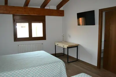 Cama o camas de una habitación en Casa Rural La Madroña