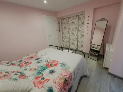 Cama o camas de una habitación en Apartamentos La Camelia