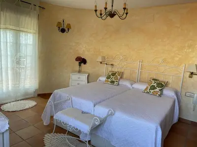 Cama o camas de una habitación en CASA SEBASTIANA SUITE