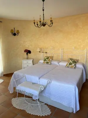 Cama o camas de una habitación en CASA SEBASTIANA SUITE
