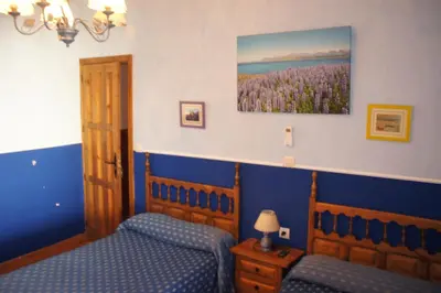 Cama o camas de una habitación en Casa Rural La Fragua de Manuel