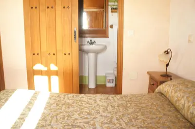 Cama o camas de una habitación en Casa Rural La Fragua de Manuel