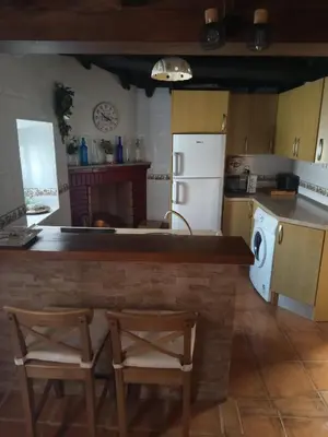 Una cocina o zona de cocina en Casa rural TIO PEDRITO