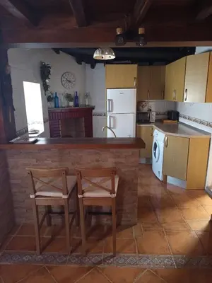 Una cocina o zona de cocina en Casa rural TIO PEDRITO