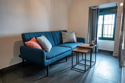 Zona de estar de Apartamentos Turísticos Cáceres 