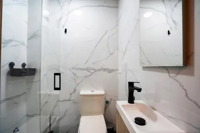 Un baño de Apartamentos Turísticos Cáceres 