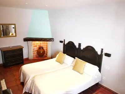 Cama o camas de una habitación en Palacio de Monjaraz