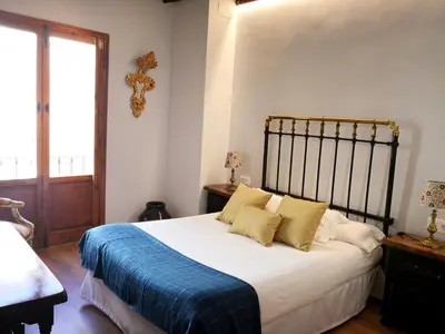 Cama o camas de una habitación en Palacio de Monjaraz