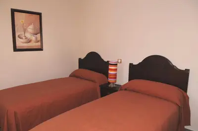 Cama o camas de una habitación en Edificio Reyes