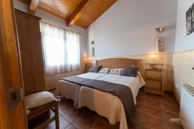 Cama o camas de una habitación en Casa rural Los Cántaros. Zarapicos