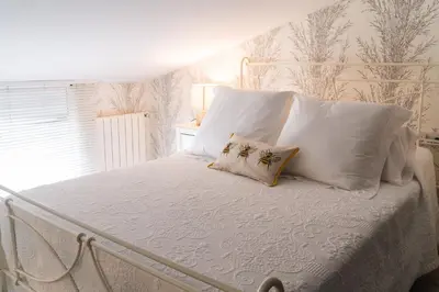 Cama o camas de una habitación en Mushara Apartamento Turístico