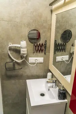 Un baño de Mushara Apartamento Turístico