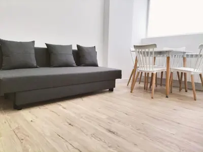 Zona de estar de Apartamentos La Brava by gaiarooms