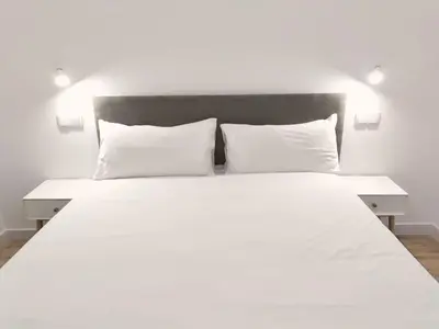 Cama o camas de una habitación en Apartamentos La Brava by gaiarooms