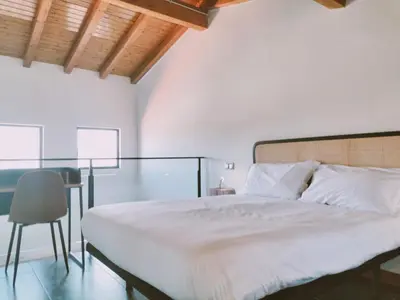 Cama o camas de una habitación en Apartamentos Walden by gaiarooms