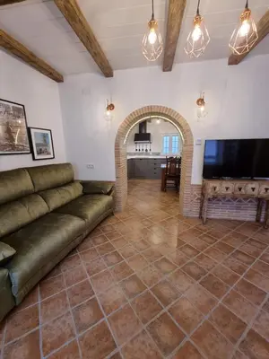 Una televisión o centro de entretenimiento en Casa Flora - Casa rural con encanto