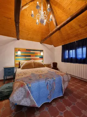 Cama o camas de una habitación en Casa Flora - Casa rural con encanto