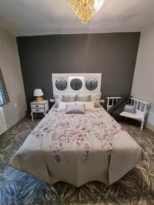 Cama o camas de una habitación en Casa Flora - Casa rural con encanto
